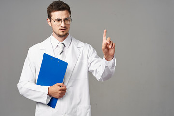 doctor holding a blank card