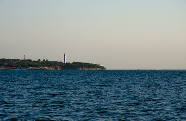 Obraz premium lighthouse at sunset