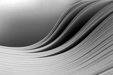 Close-up of a bending stack of paper - 308714308
