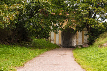 Fredrikshamn Gate surrounded by trees in overcast day, Annenkrone, Vyborg, Leningrad Oblast, Russia