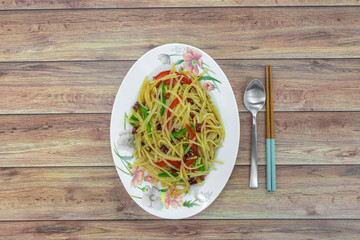 Authentic traditional China Sichuan Chinese home cooking : Stir-fried shredded potato with green red pepper. Vegetable dish, sour and spicy taste, potato crisp and delicious. Flat lay top down view.