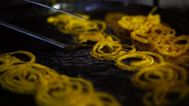 Tempting Indian desert (Jilebi) prepared in a kitchen
