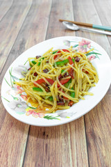 Traditional China Sichuan Chinese home cooking : Stir-fried shredded potato with green red pepper. Vegetable dish, sour and spicy taste, potato crisp and delicious.