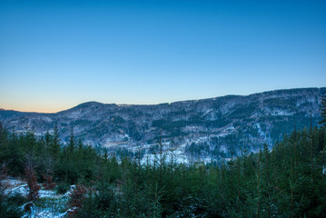 often snow covered hills in the mountains , beskydy czech