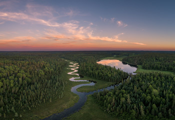 An aerial view of a winding Clearwater Creek in Northwest Ontario, Canada. - obrazy, fototapety, plakaty