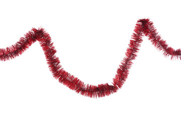 Christmas tinsel hanging on white background