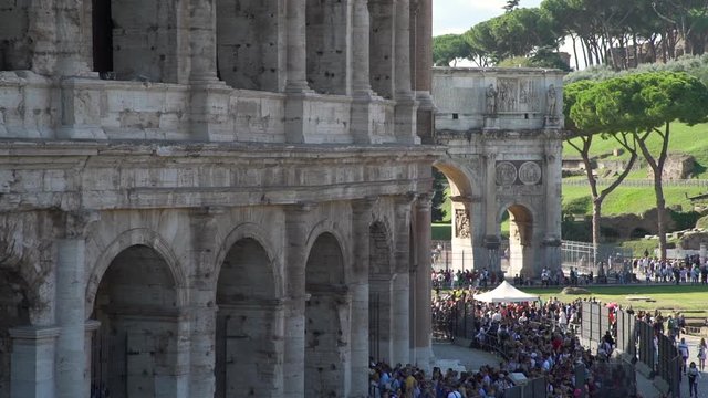Big Crowd of People near the Entrance of Coliseum in Rome, Italy. They are Waiting for their Turn to Get Inside the Ancient Roman Amphitheatre. Concept of Holidays, Vacations and Travel in Europe