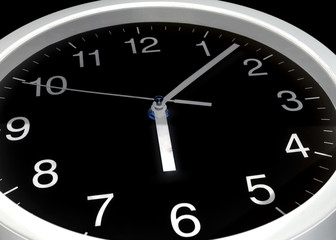 Clock or time abstract background, black clock and white needles, six o'clock, seven minutes