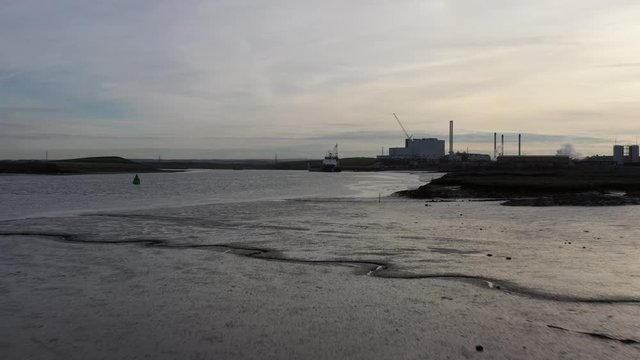 Wide aerial view of industry on the Swale Estuary in the UK
