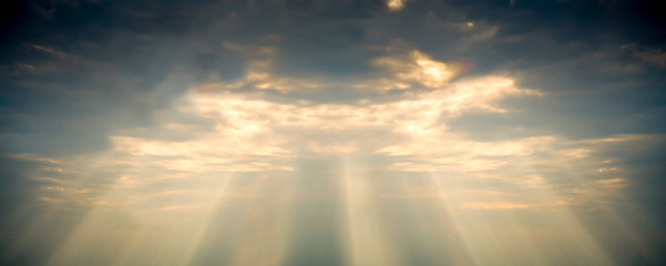 Fototapeta premium The golden god sun ray light through cloud