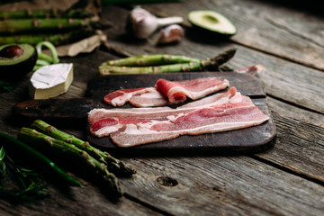 Sliced ​​bacon on a cutting board