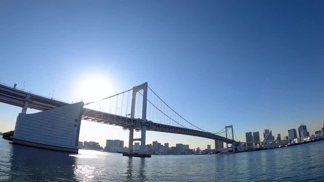 快晴の東京ベイクルーズ ウォーターフロントの風景 / Scenery of Tokyo Bay Cruise on the water bus. The ship passes under the Rainbow Bridge.