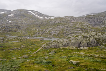 Fototapeta na wymiar rocky slopes in barren mountains, near Finse, Norway