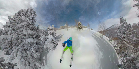 SELFIE: Skier almost crashes while skiing off piste in the mountains of Utah.