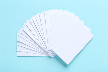 Blank business cards on blue background