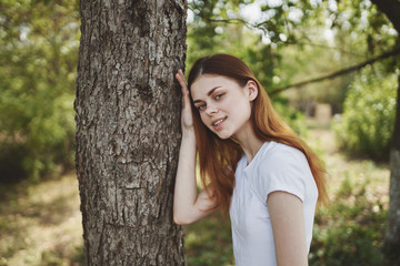 portrait of young woman in park