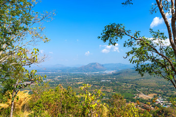 Beautiful panoramic view green forest mountain range Phu Thok Park in Loei province,Thailand, blue sky background texture with white clouds