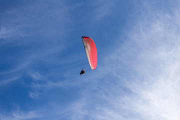paragliding in the blue sky