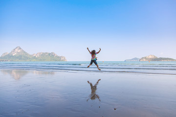 Jumping Girl, Beautiful girl jumping at the beach.