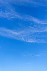 paragliding in the blue sky