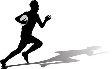 rugby player runs with a ball and shadow
