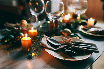 Table served for winter dinner in living room. Close up view, table setting. Christmas and winter...