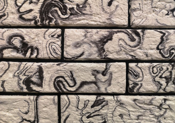 decorative brickwork with a black and white pattern