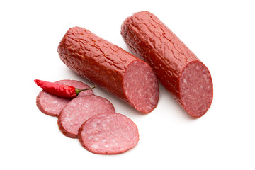 Salami smoked sausage, basil leaves on white background cutout.