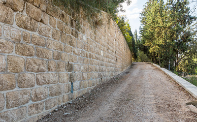 Fototapeta na wymiar Dirt path leading to the monastery on the territory of Emmaus Nicopolis
