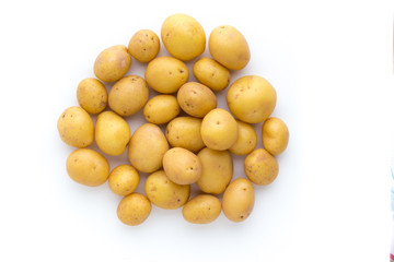 Young potato isolated on white background. Harvest new. Flat lay, top view