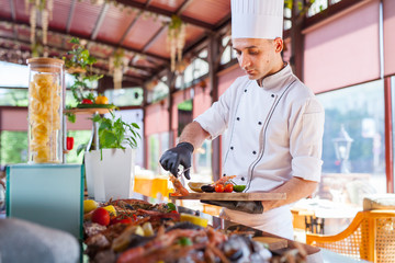 cooking seafood in a restaurant.