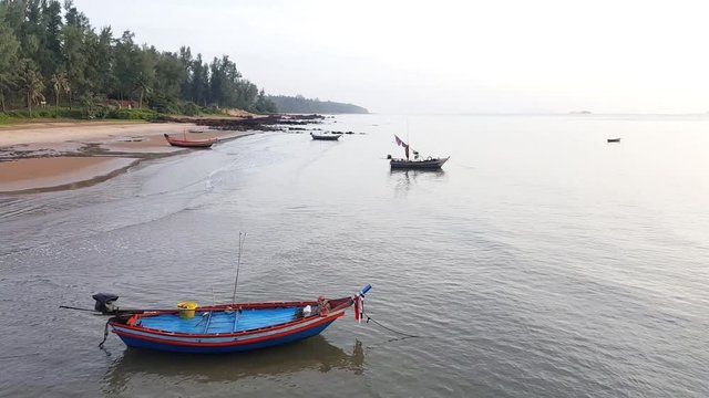 small fishing boats parked at Bang Berd Beach, Bang Saphan Noi District, Prachasiri Khiri Khan, Thailand