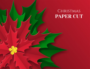 Background with a red flower. Christmas poster in paper art style. Poinsetia with green and red leaves. Place for text