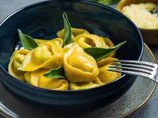 Homemade tortelloni with ricotta and spinach.