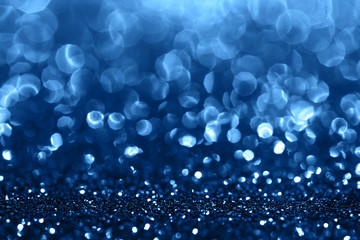 Blue sparkling abstract background. Festive concept. Color of the year 2020 concept.