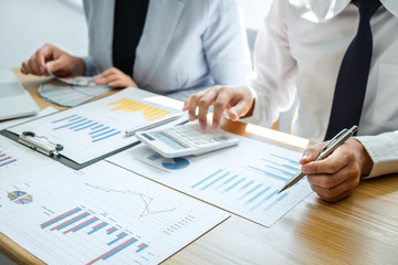 Two business partner team conference and discussion in investment ideas marketing planning and presentation finance project at meeting and strategy of business making to growth of profit