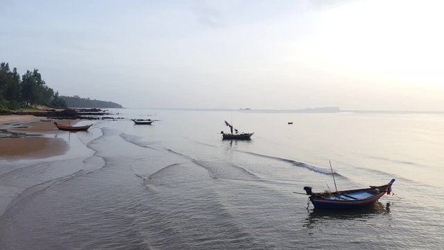 small fishing boats parked at Bang Berd Beach, Bang Saphan Noi District, Prachasiri Khiri Khan, Thailand