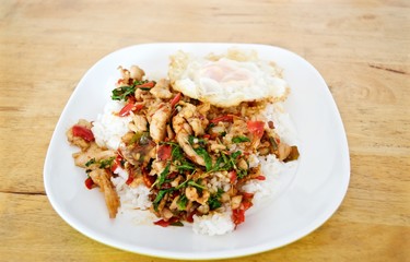Stir fries Chicken breast with chili and Thai hot basil (Thai street food : Pad Kra Praow Kai)
