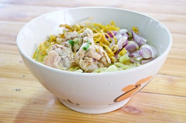 Curry Noodle Soup with Chicken (KhaoSoi Kai), Thai traditional northern style food.