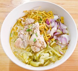 Curry Noodle Soup with Chicken (KhaoSoi Kai), Thai traditional northern style food.