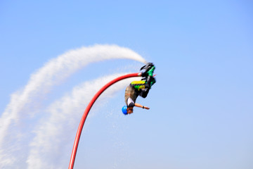 Water stunts performance in a park