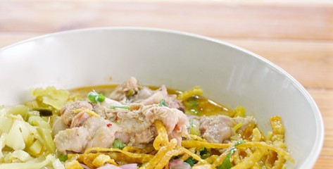 Curry Noodle Soup with Chicken (KhaoSoi Kai), Thai traditional northern style food.