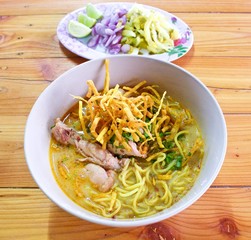 Curry Noodle Soup with Chicken (KhaoSoi Kai), Thai traditional northern style food.
