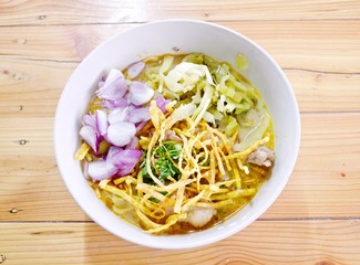 Curry Noodle Soup with Chicken (KhaoSoi Kai), Thai traditional northern style food.