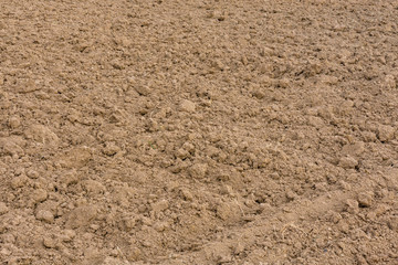 Background of the plowed field prepared for sowing