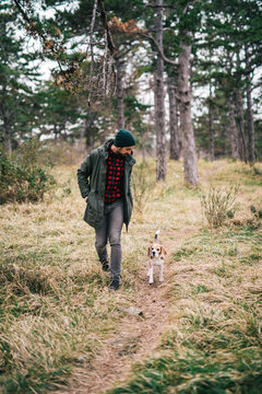 Man and his dog running