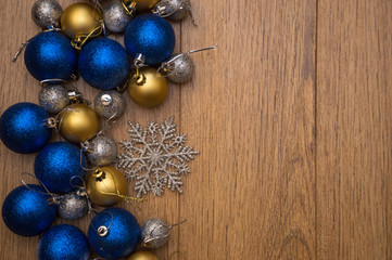 christmas balls on wooden background