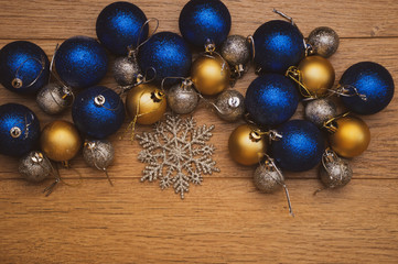 christmas balls on wooden background