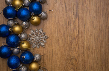 christmas balls on wooden background