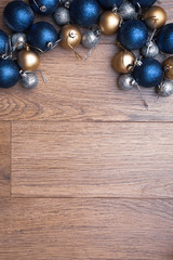 christmas balls on wooden background
